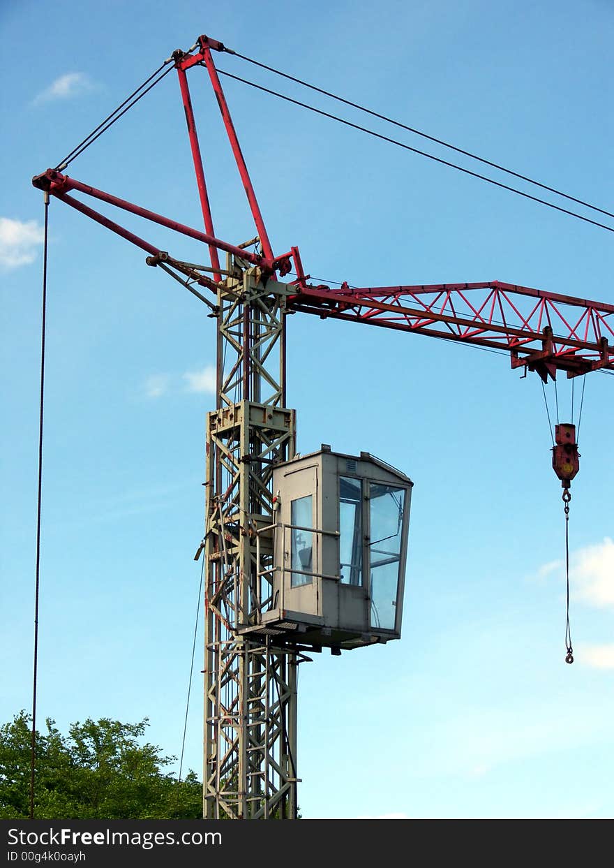 Portrait of old mobile crane at construction site