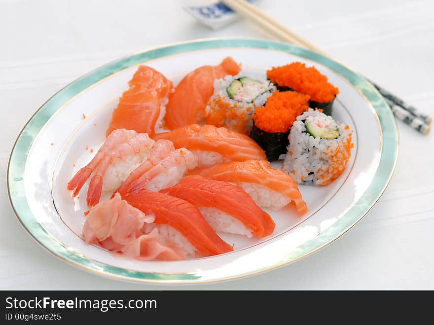 Plate of sushi with chopstick. Plate of sushi with chopstick