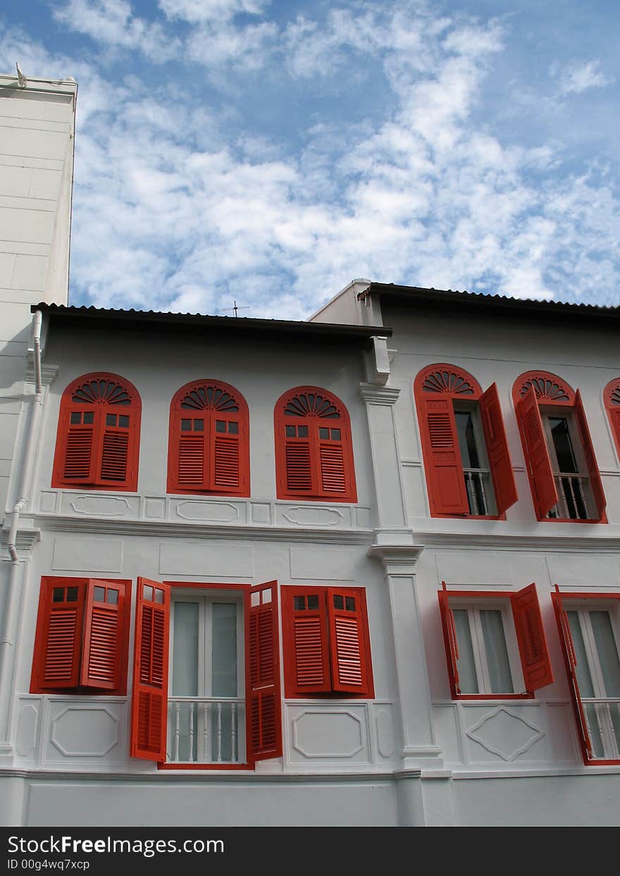 A building full of red traditional chinese window. A building full of red traditional chinese window