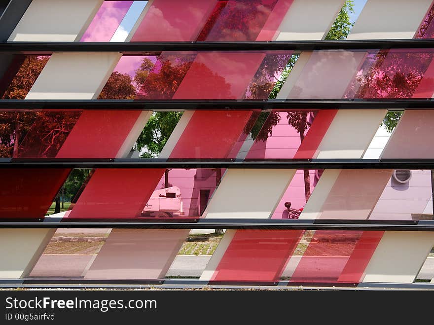 Colorful tinted glass walk way in the parks