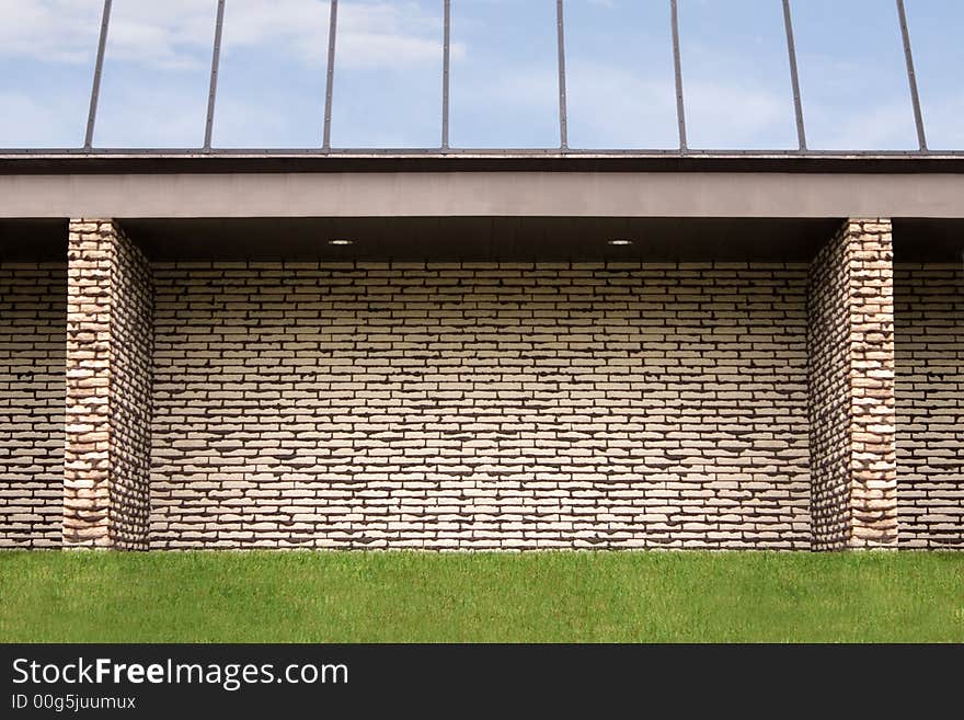 The brick wall of an office building