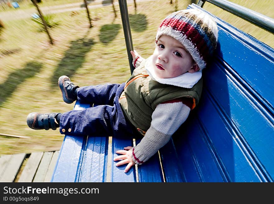 Boy in swing