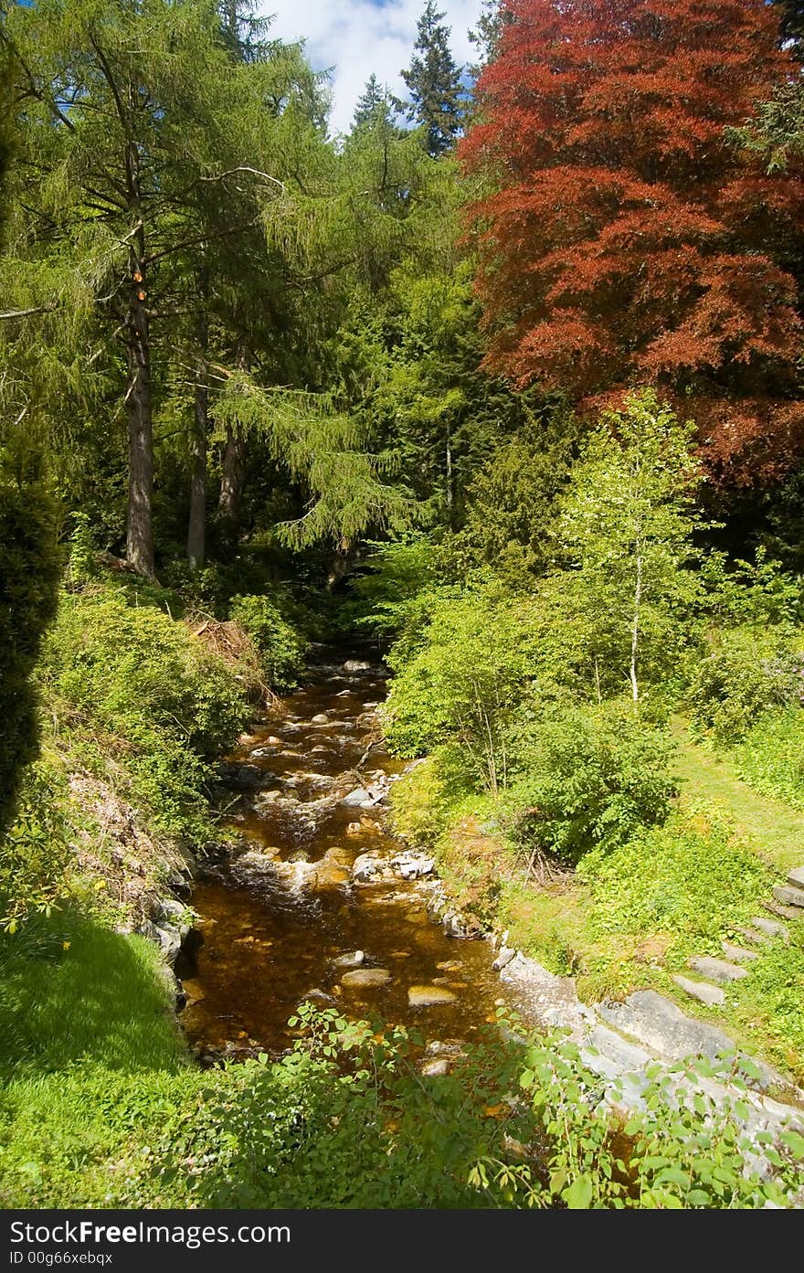 By the river in blair castle gardens, perthshire, scotland, united kingdom. By the river in blair castle gardens, perthshire, scotland, united kingdom.