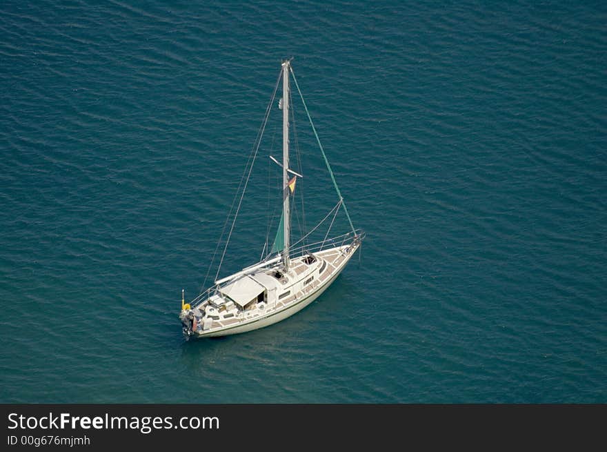 A single large yacht sitting in the sea