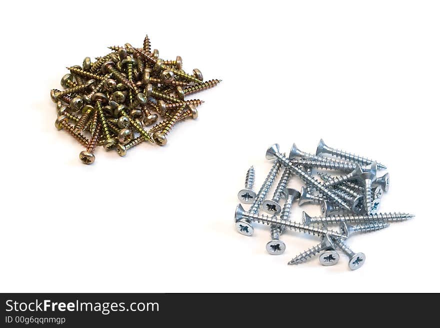 Resistance of steel and chrome screws on the white background. Resistance of steel and chrome screws on the white background