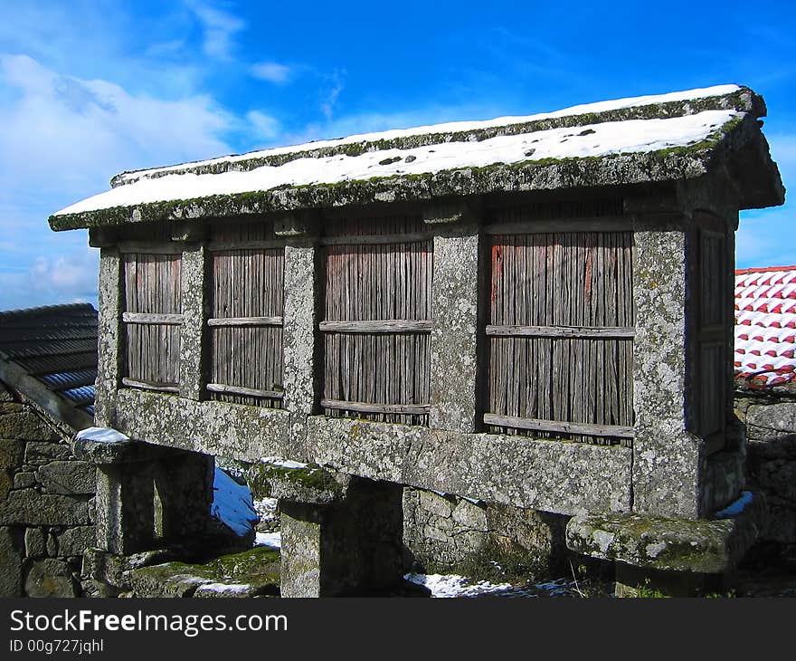 The Espigueiros are mostly stone (sometimes wood) constructions in Northern Portugal where the corn is dried in the Winter. The Espigueiros are mostly stone (sometimes wood) constructions in Northern Portugal where the corn is dried in the Winter.