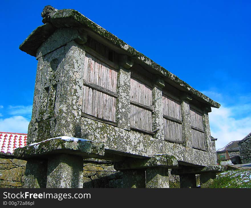 The Espigueiros are mostly stone (sometimes wood) constructions in Northern Portugal where the corn is dried in the Winter. The Espigueiros are mostly stone (sometimes wood) constructions in Northern Portugal where the corn is dried in the Winter.