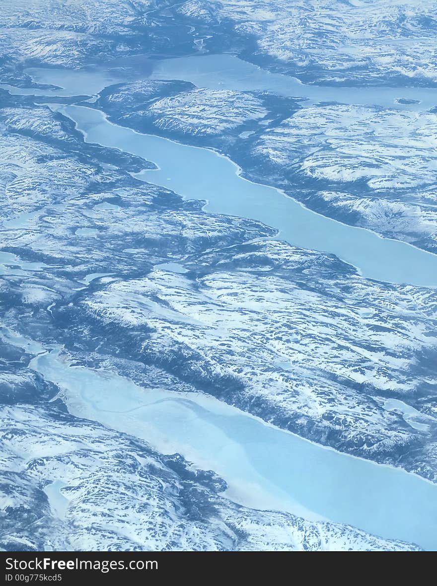 Arial view of the icecovered land of Canada. Arial view of the icecovered land of Canada