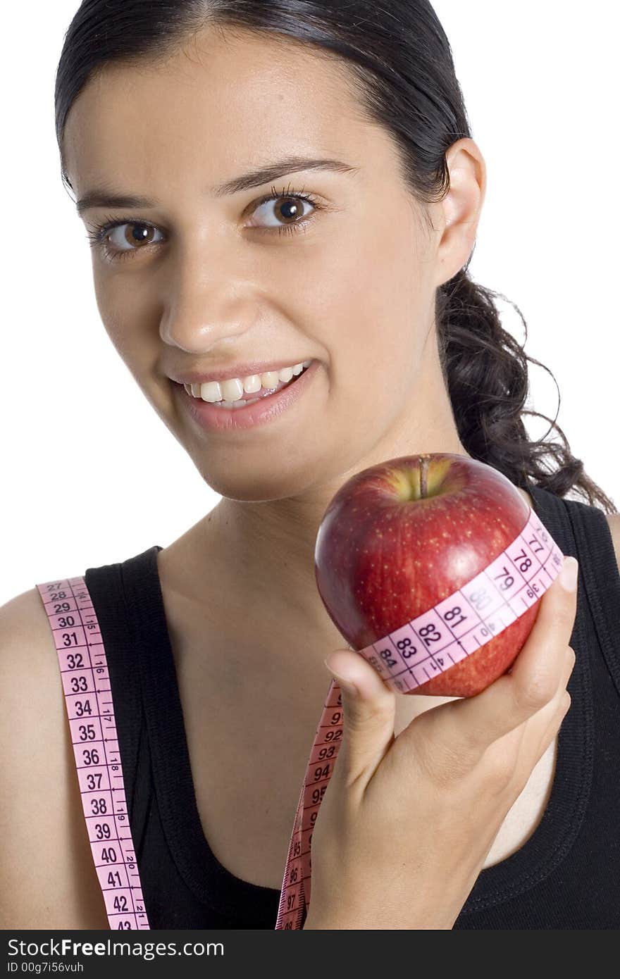 Smiling girl with apple and measuring tape. Smiling girl with apple and measuring tape