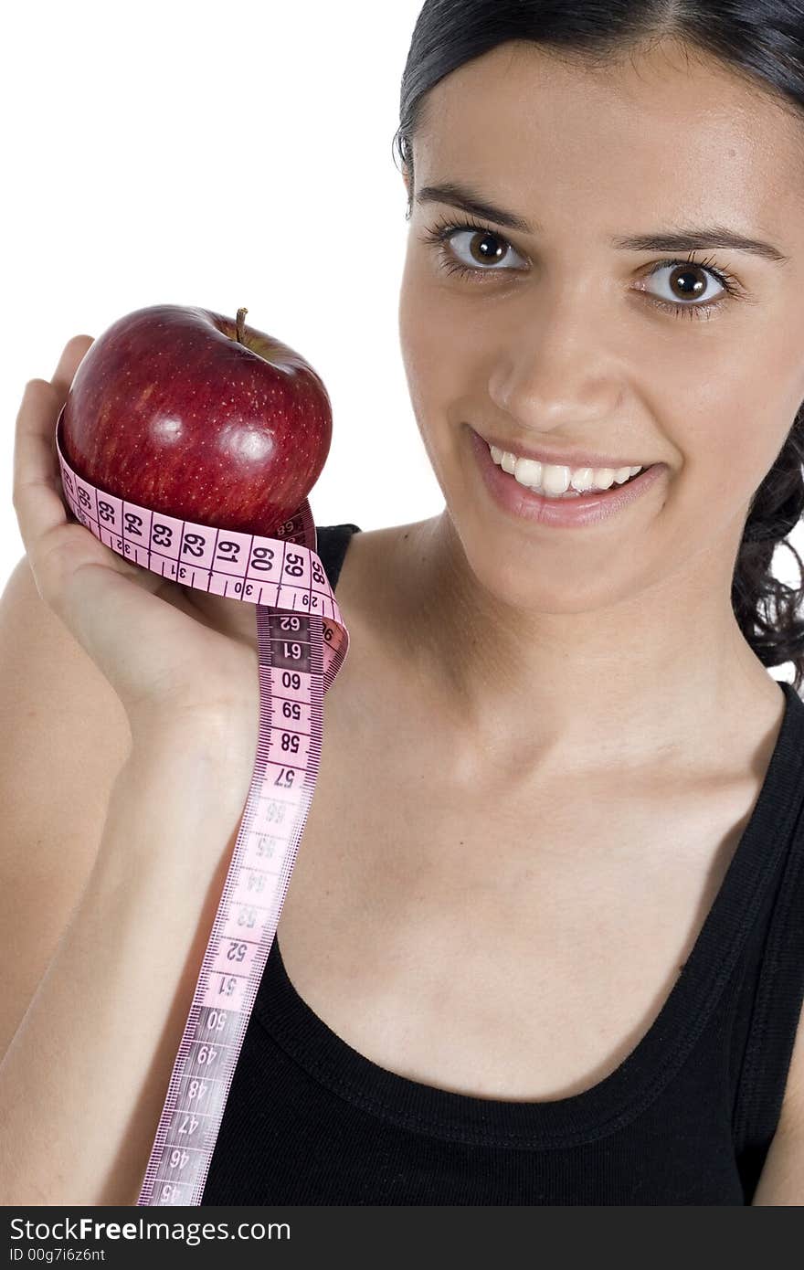 Smiling girl with apple and measuring tape. Smiling girl with apple and measuring tape