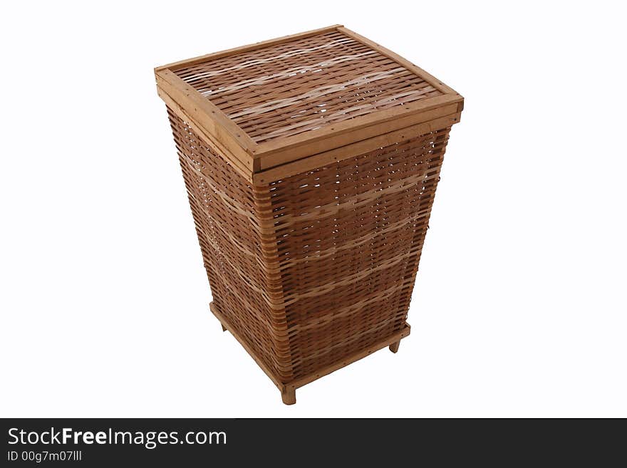 An isolated over white wicker storage basket, brown and light brown in color with wood borders.  Rustic.