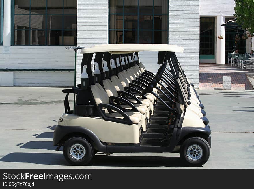 Line of golf carts in sunny Arizona