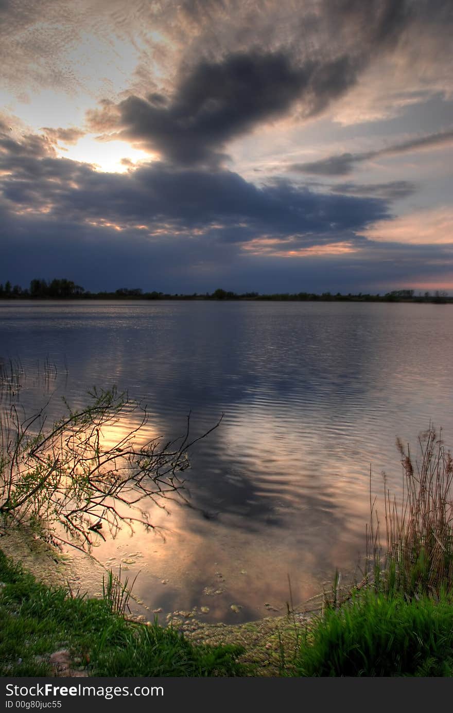 Storm clouds over a lake. Storm clouds over a lake