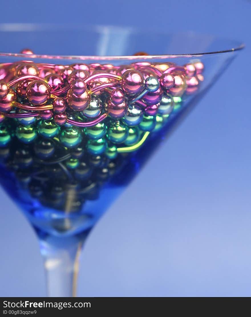 A martini glass full of titanium navel rings