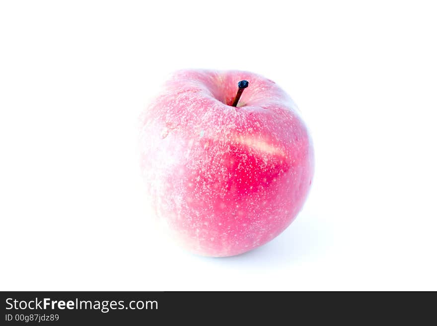 Apple in high key isolated on white with small shadow