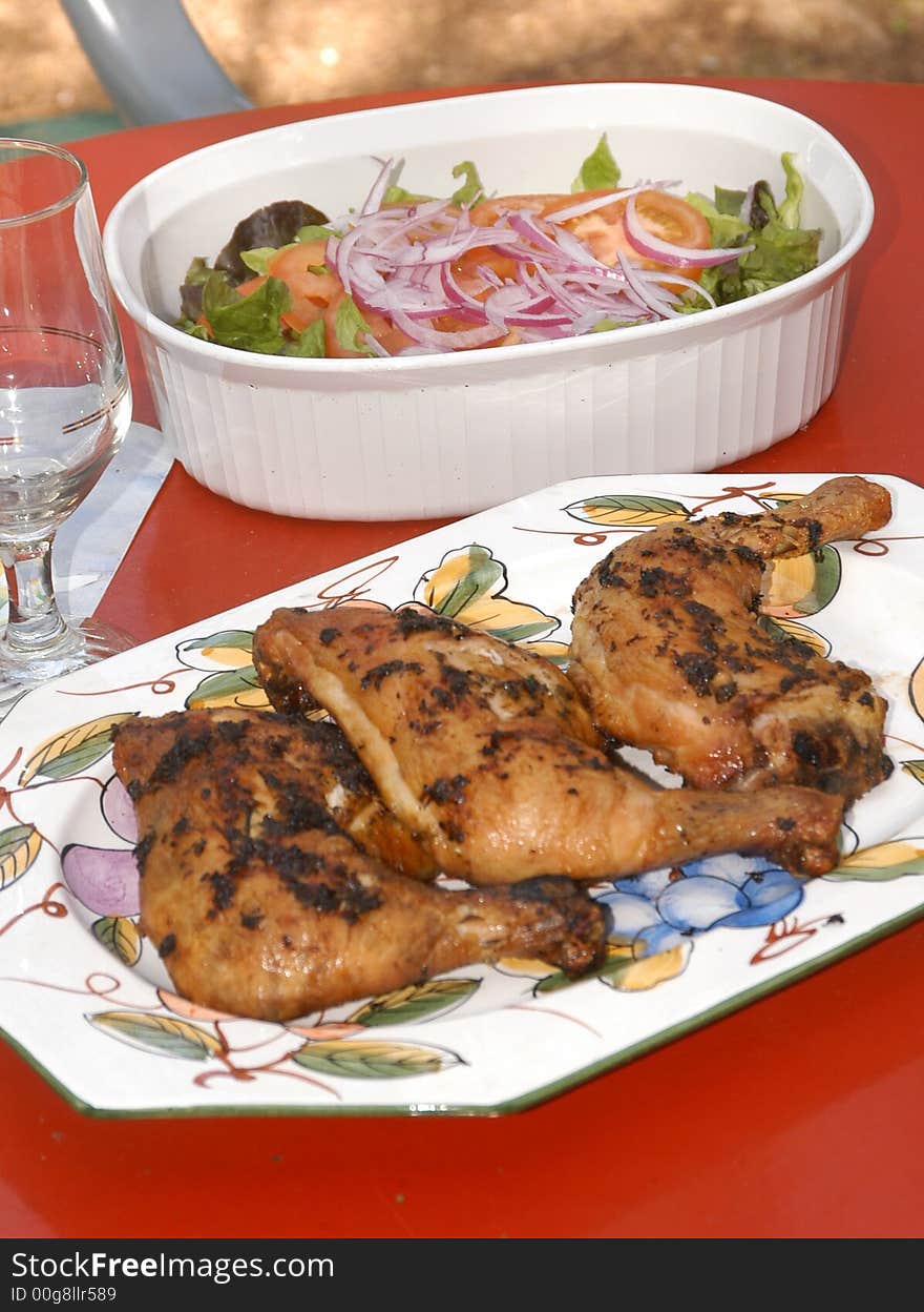 Barbecue chicken leg and healthy salad. Barbecue chicken leg and healthy salad