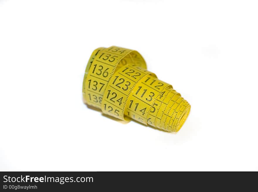 A yellow centimeter measure on white background