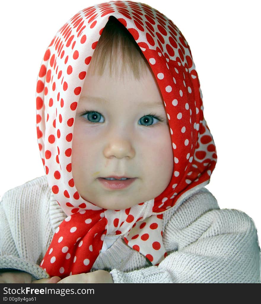 A 1 year old girl in a spotted kerchief. A 1 year old girl in a spotted kerchief