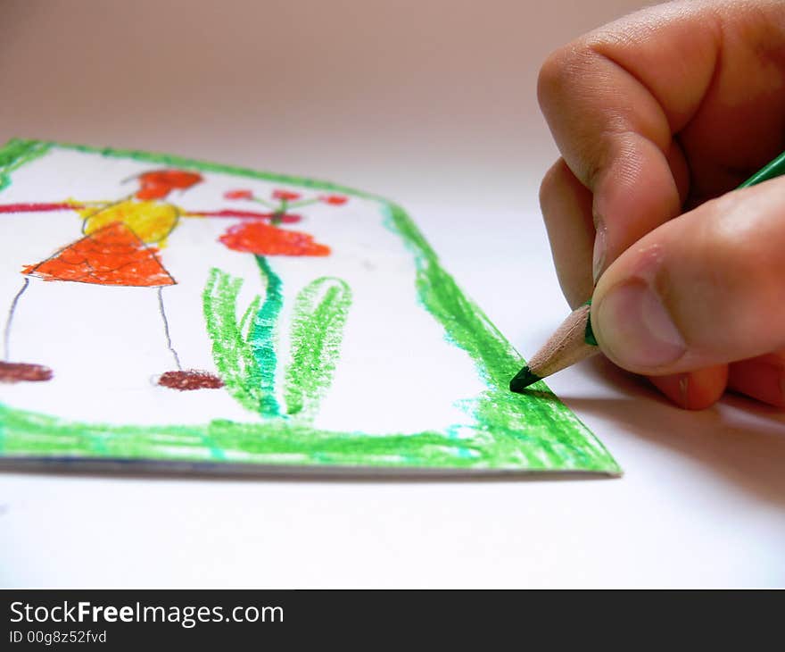 The boy is drawing a wish for mother.