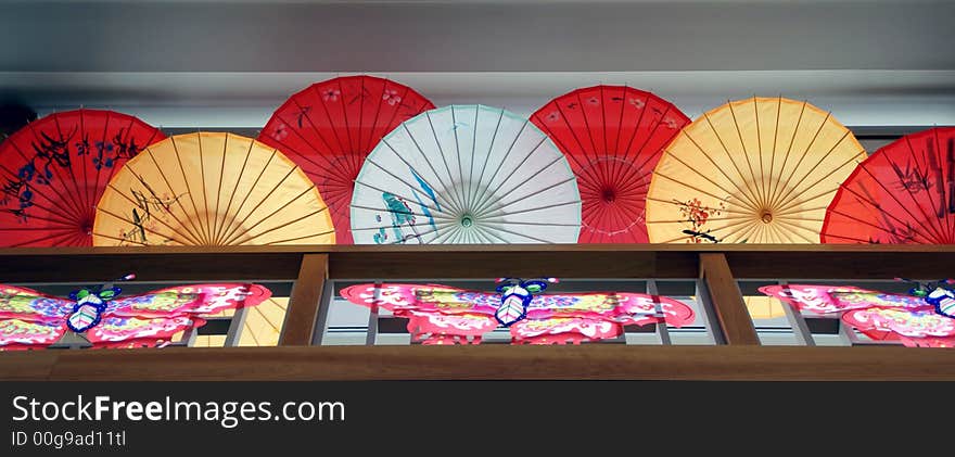 Photo of colorful umbrella inside pavillion