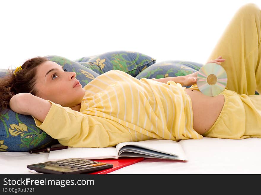 Beautiful young woman holding cd and resting from work. Beautiful young woman holding cd and resting from work