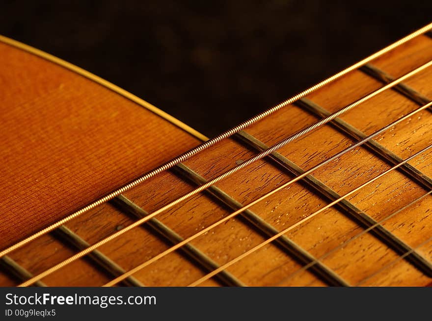 Detail of an acoustic country guitar. Detail of an acoustic country guitar