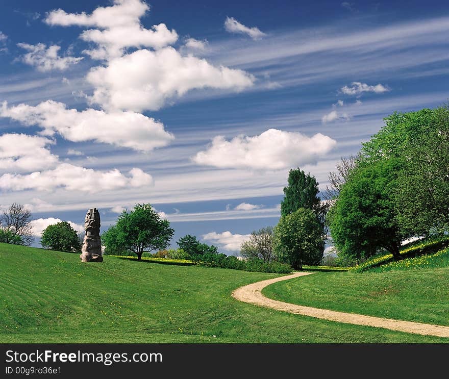 Park of sculptures in Latvia on a background of the beautiful sky