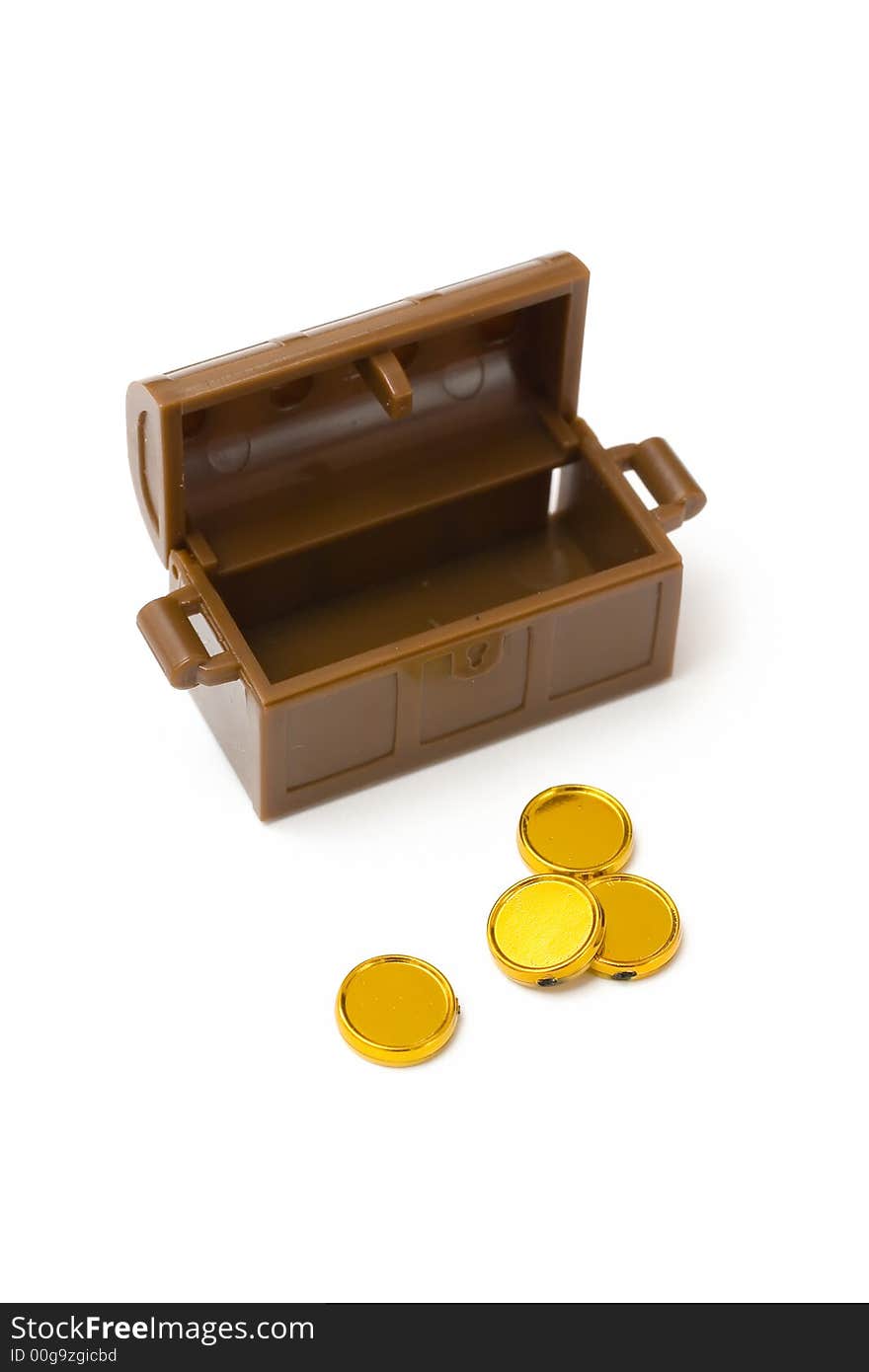 Toy treasure chest with golden coins. Toy treasure chest with golden coins