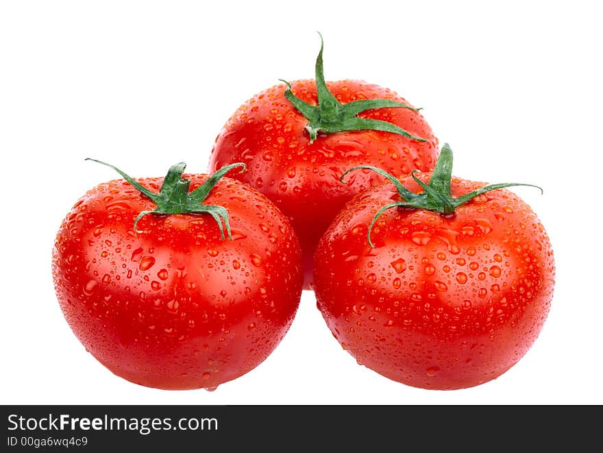 Red tomatoes. Isolated over white background