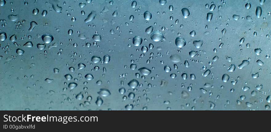 Water drops on glossy surface