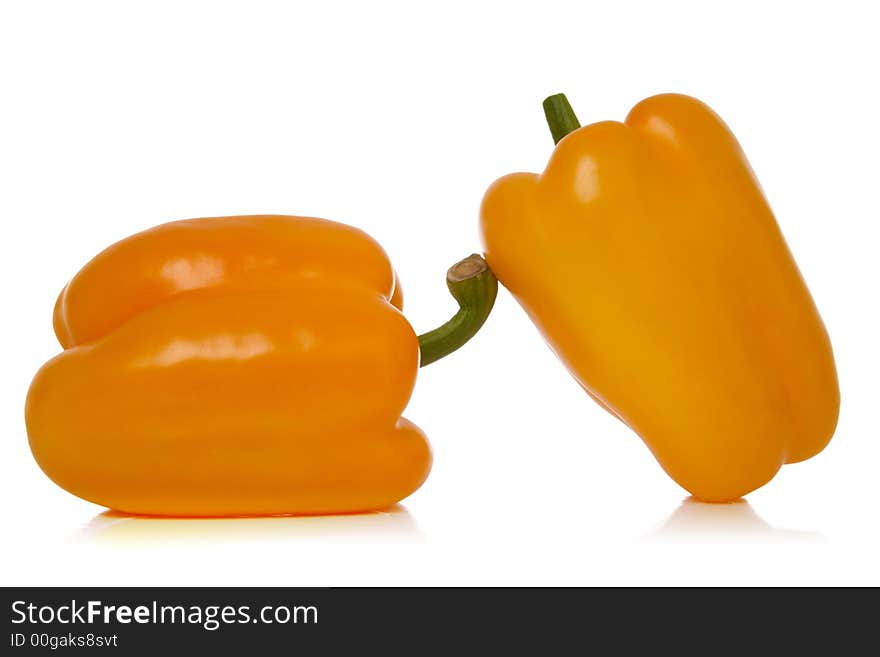 Yellow peppers isolated over white background