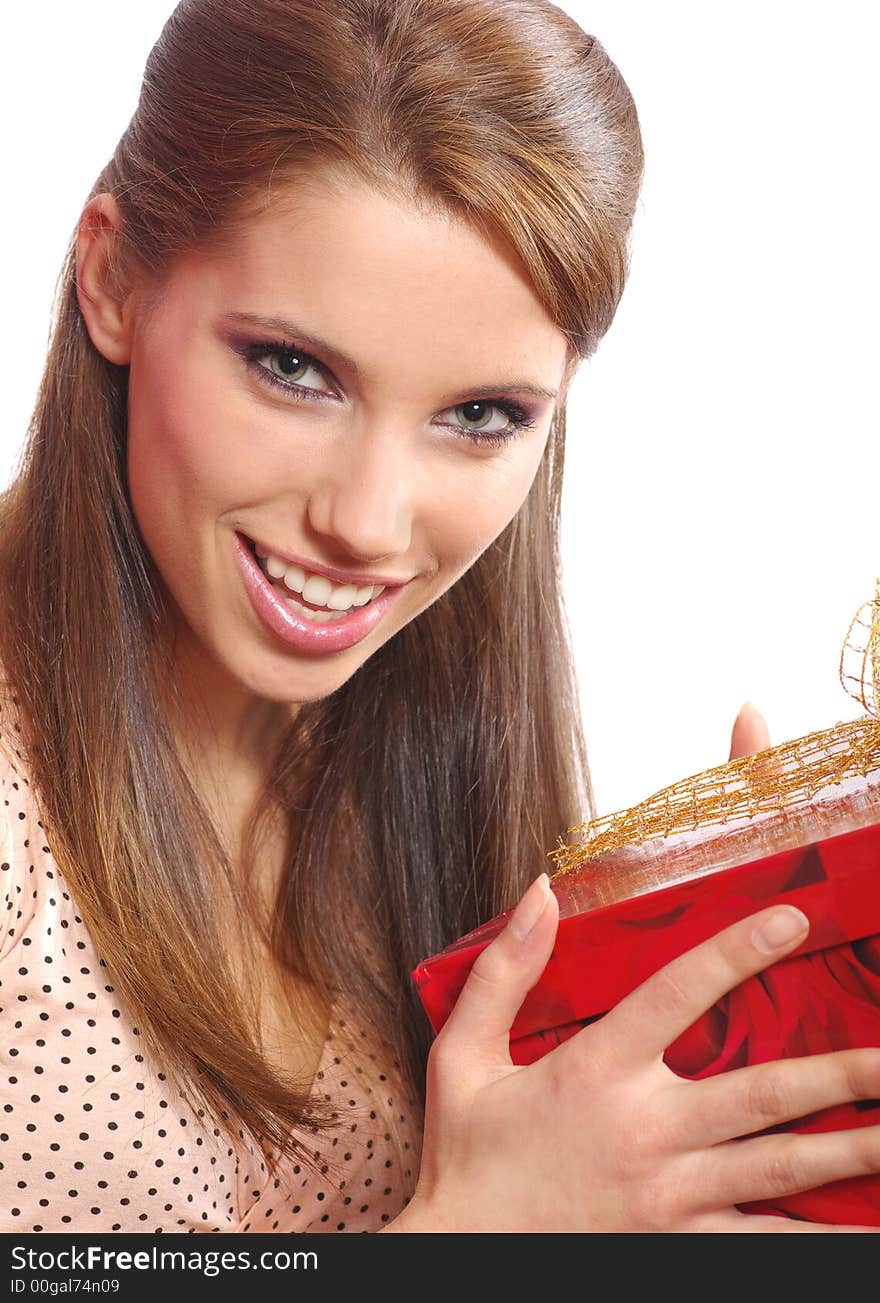 Smiling woman holding a gift box