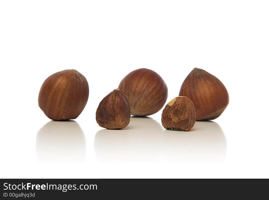 Hazelnuts isolated over white background