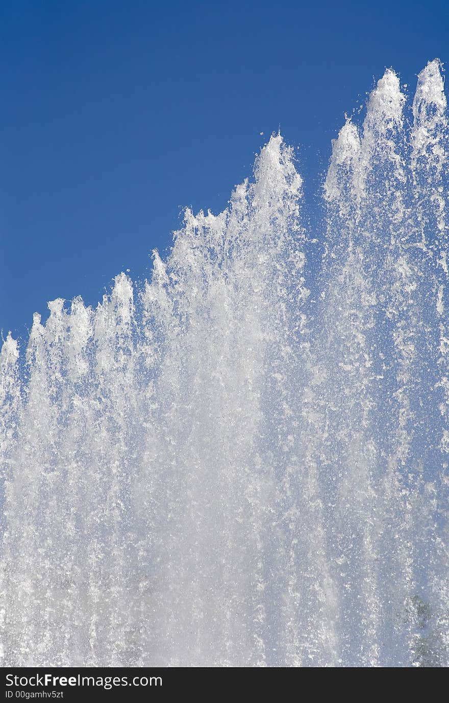 Fountain on a background of the sky. Fountain on a background of the sky