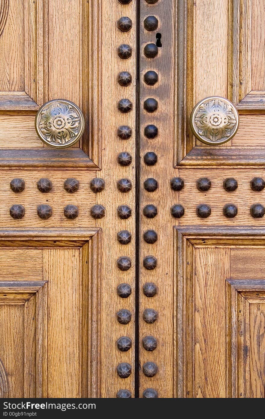 Light wooden door with a keyhole