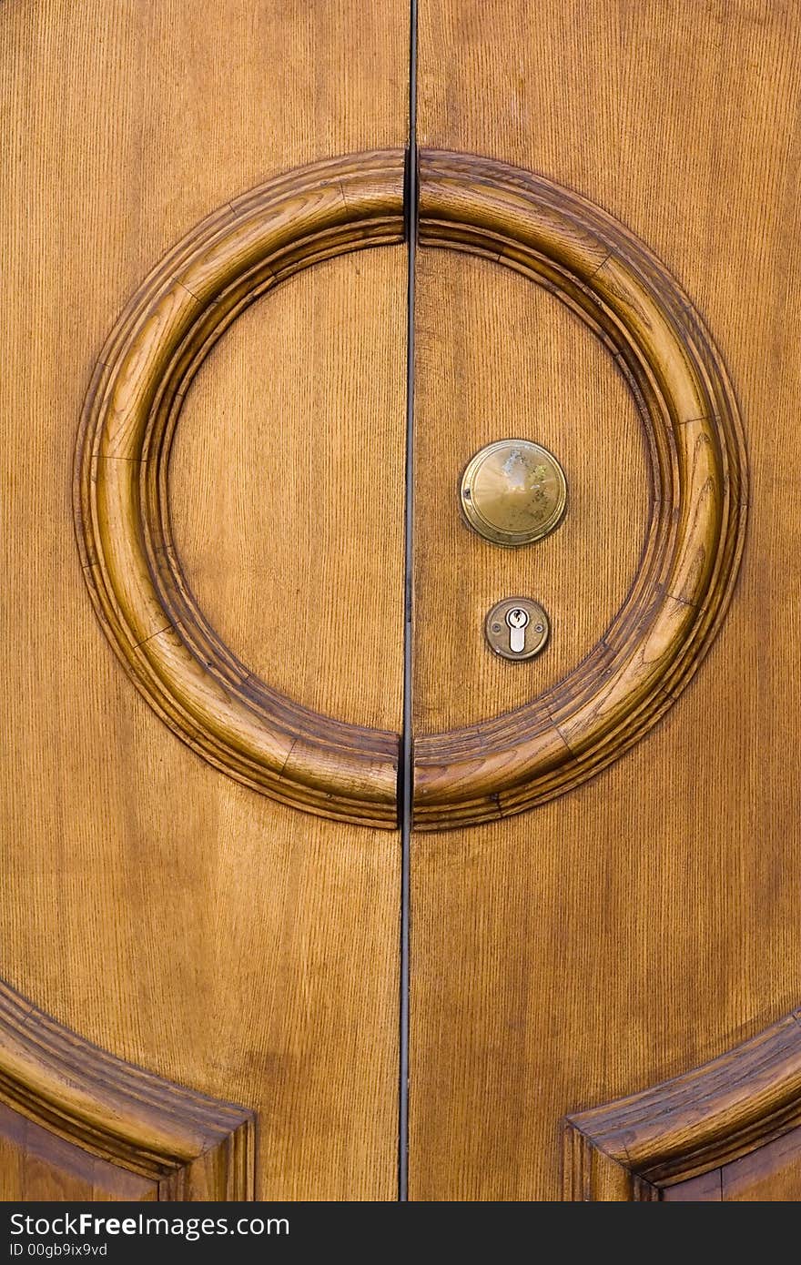 Light wooden door with a keyhole
