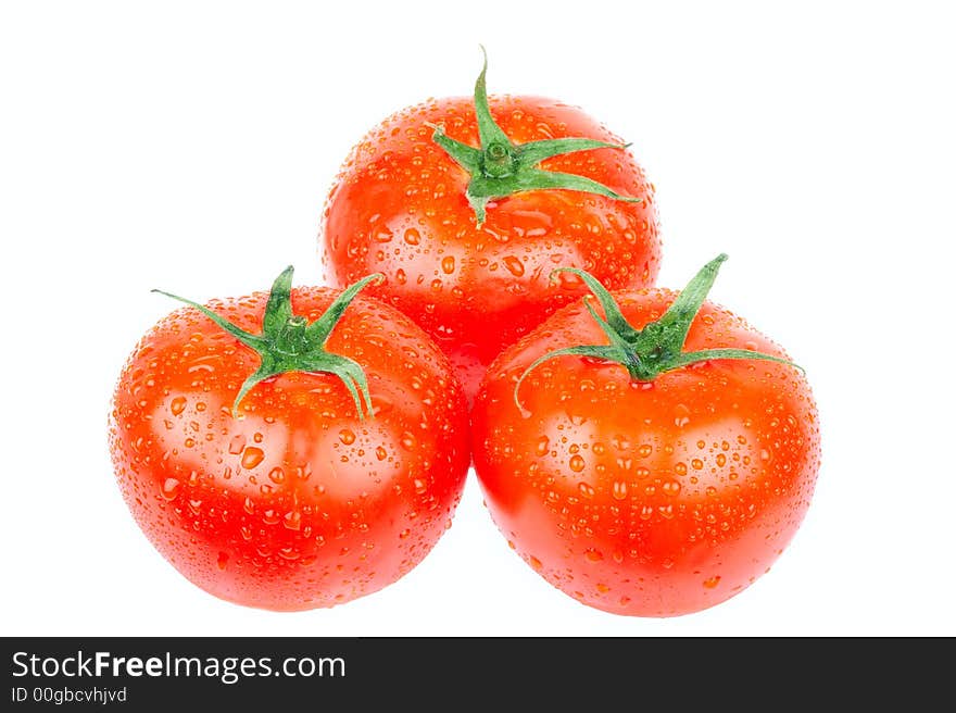 Red tomatoes. Isolated over white background