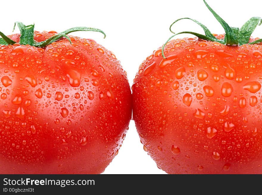 Red tomatoes. Isolated over white background