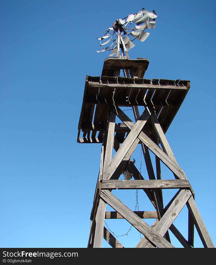 A low-angle rustic windmill in Arizona. A low-angle rustic windmill in Arizona