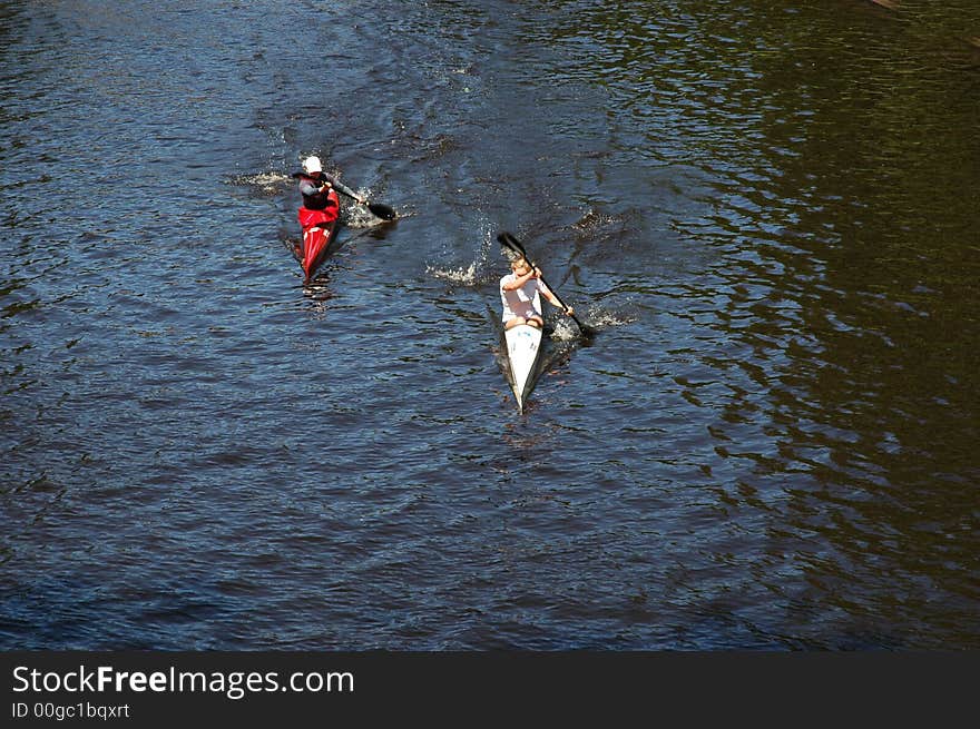 Competition of kayaks on the channel in Riga