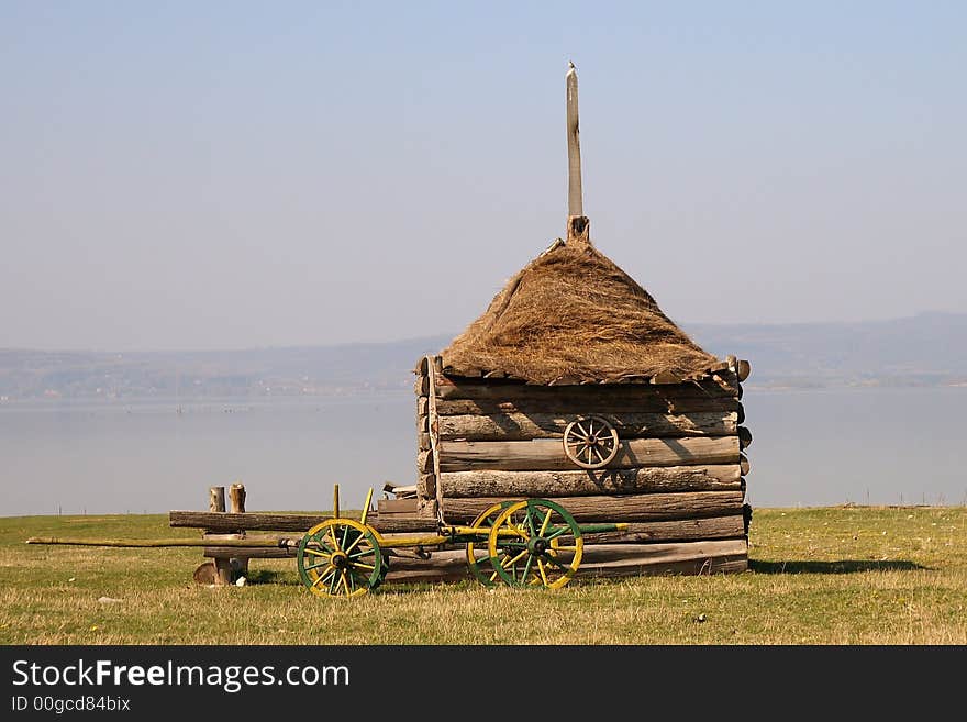 Cottage with buggy coloured  near Danube in Banat in Romainia. Cottage with buggy coloured  near Danube in Banat in Romainia.