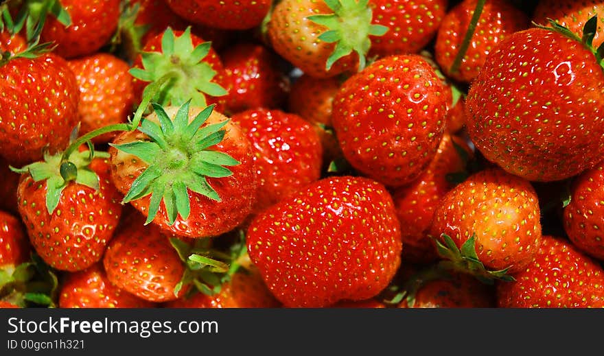 Fresh red strawberry background - fruits