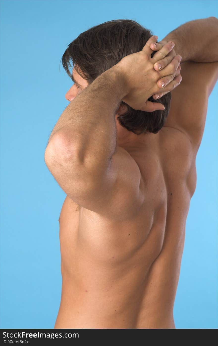 Close up of a young man back over blue background