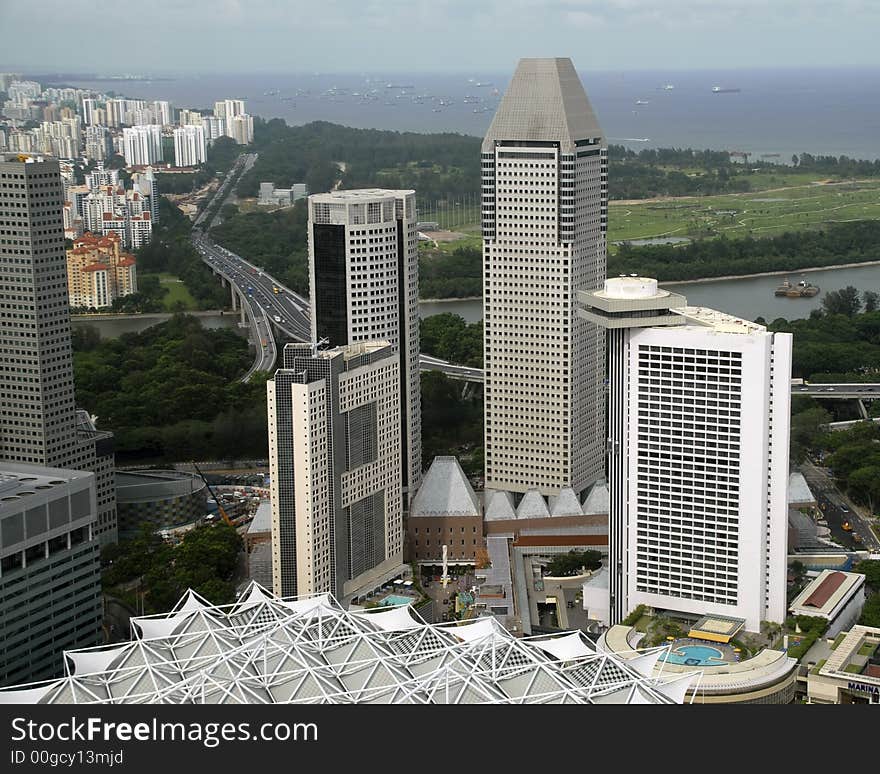 A cluster of hotels and office buildings along the busiest shipping channel in the world. A cluster of hotels and office buildings along the busiest shipping channel in the world