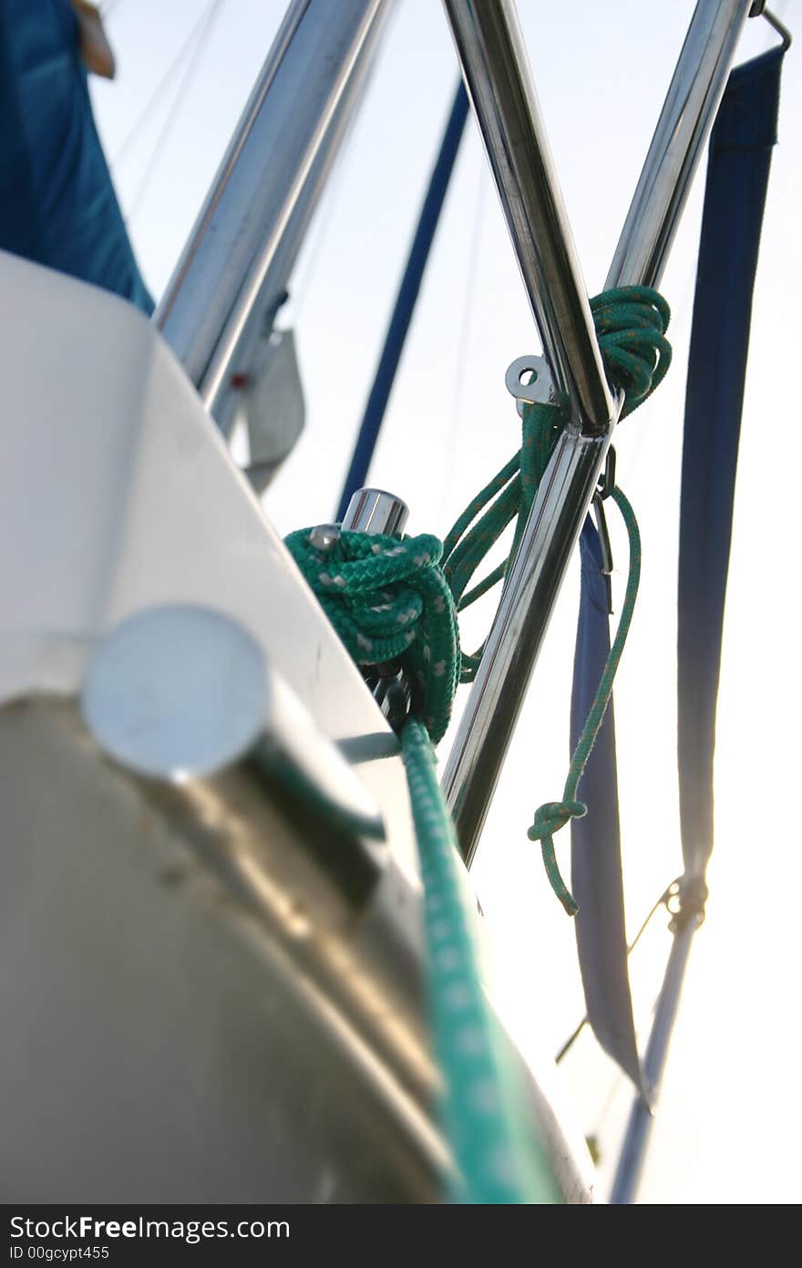 Sailboat detail with rope tied in a knot. Sailboat detail with rope tied in a knot