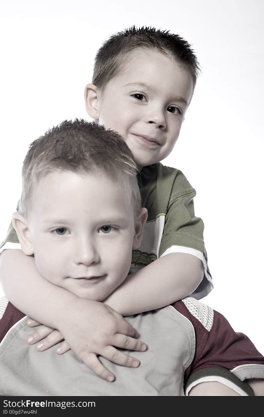 A beauty portrait taken from a young boy child in the studio. A beauty portrait taken from a young boy child in the studio