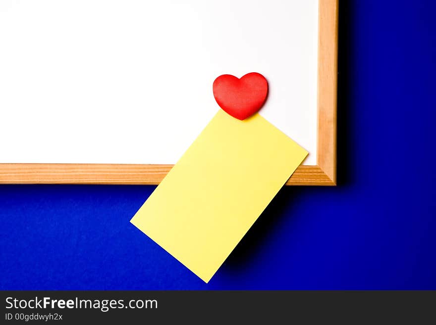 Whiteboard with empty yellow post-it note and magnet in the form of a hart.white-board with empty yellow post-it note and magnet ready for a message.please take a look at my other images of this item. Whiteboard with empty yellow post-it note and magnet in the form of a hart.white-board with empty yellow post-it note and magnet ready for a message.please take a look at my other images of this item