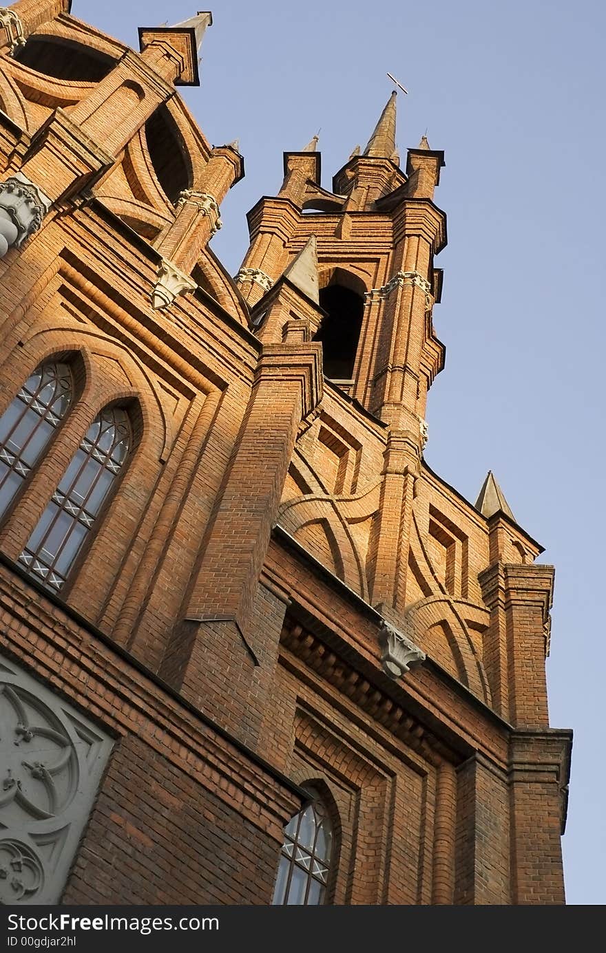 Catholic Church of red brick. The Gothic style. Catholic Church of red brick. The Gothic style