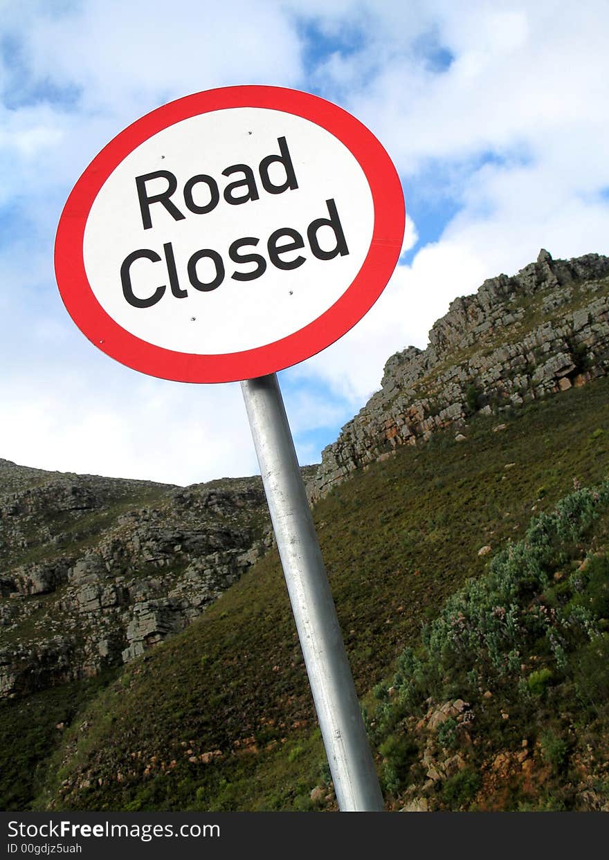 Portrait photo of a road closure sign. Portrait photo of a road closure sign.