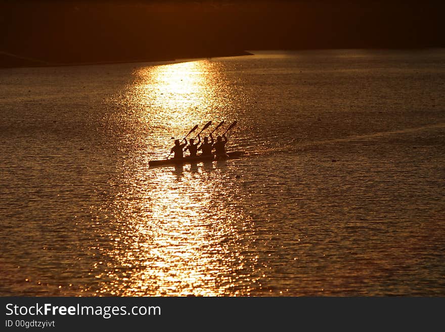 Four men in a canoe. Four men in a canoe